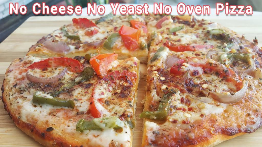 'Video thumbnail for No Cheese, No Mayo, No Yeast & No Oven Veg Pizza for Lockdown | White Sauce Pizza Recipe'