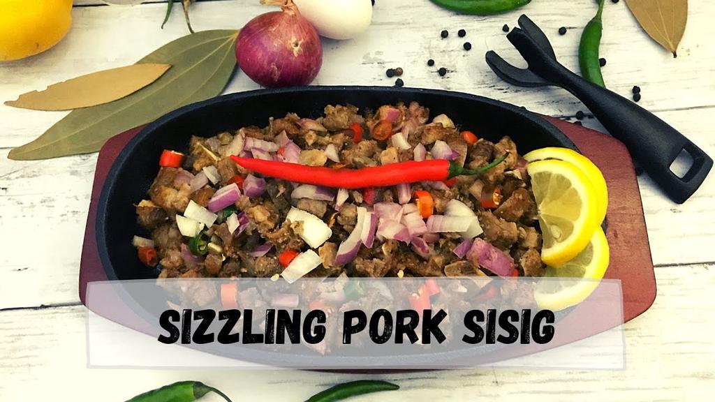 'Video thumbnail for Sizzling Pork Sisig - Kapampangan style Recipe | Happy Tummy Recipes'